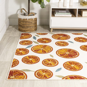 HomeRoots 5' Orange and Cream Polka Dot Area Rug - Stylish Indoor/Outdoor Comfort with Weather-Resistant Design 702690
