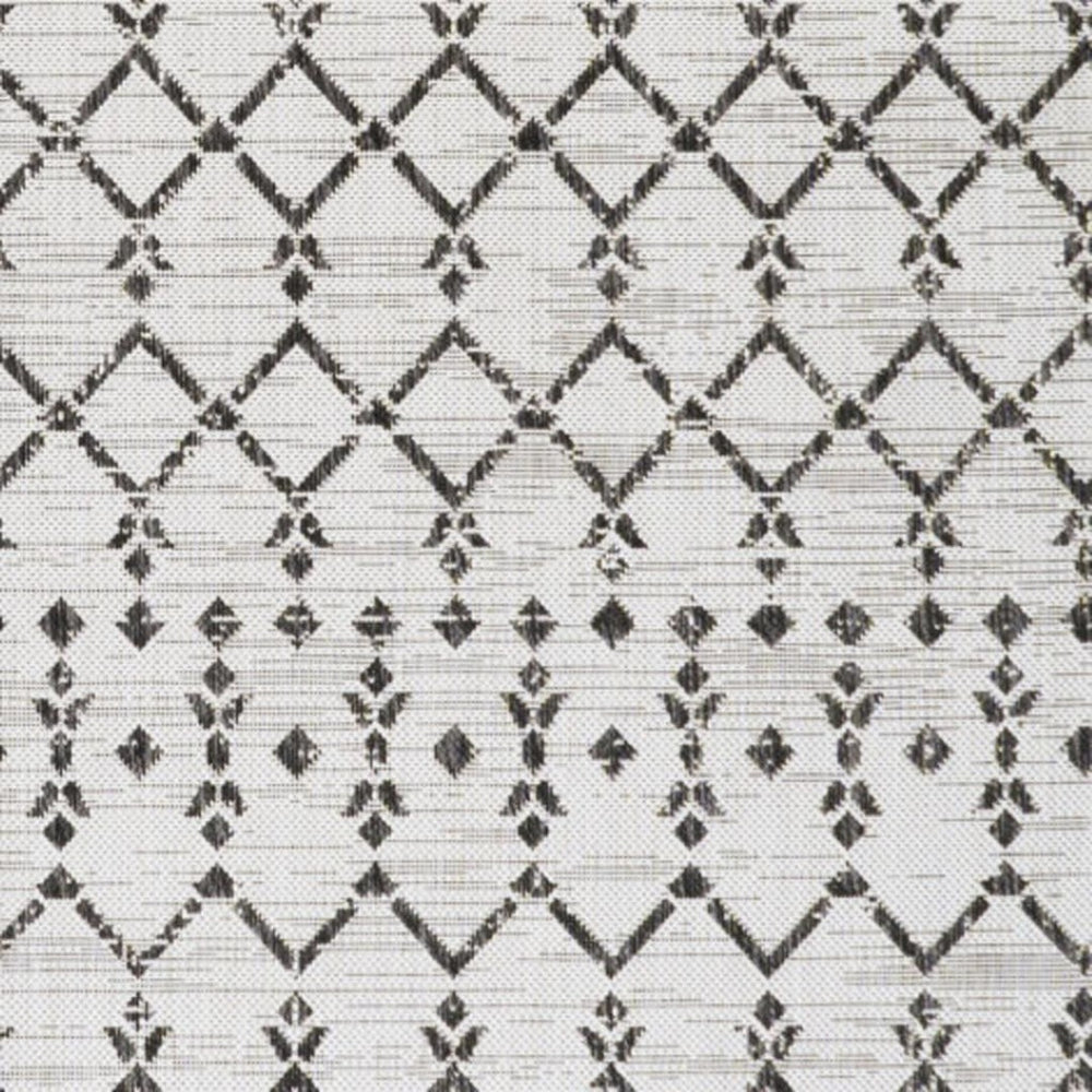 HomeRoots 9' Cream and Black Trellis Area Rug – Stylish Indoor/Outdoor Solution for Easy Care and Elegance! 702807