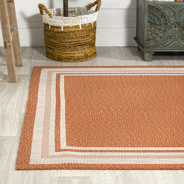HomeRoots 8' X 10' Vibrant Orange and Cream Area Rug - Durable, Low-Maintenance, Perfect for Indoor & Outdoor Use 702874