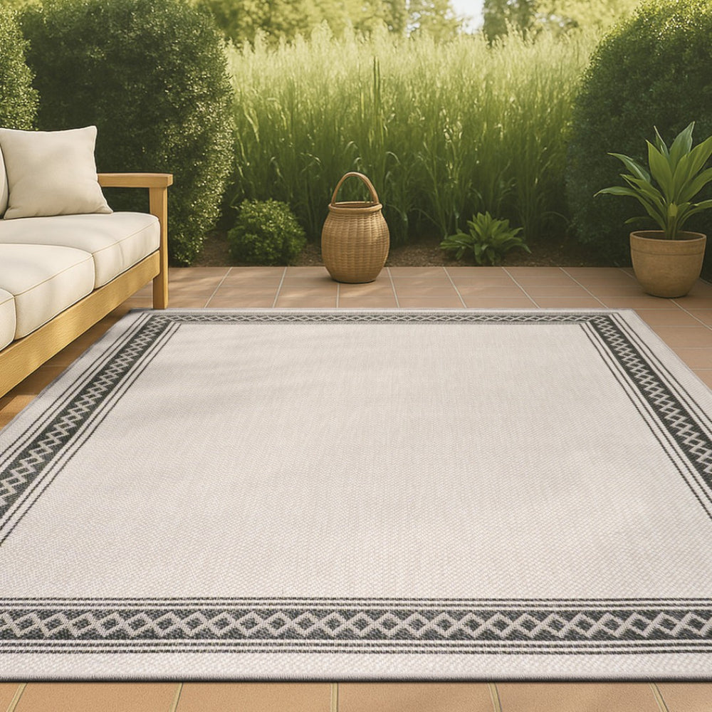 HomeRoots 8' X 10' Cream and Black Area Rug – Durable, Versatile Indoor/Outdoor Style for Any Space, Easy Care! 702923