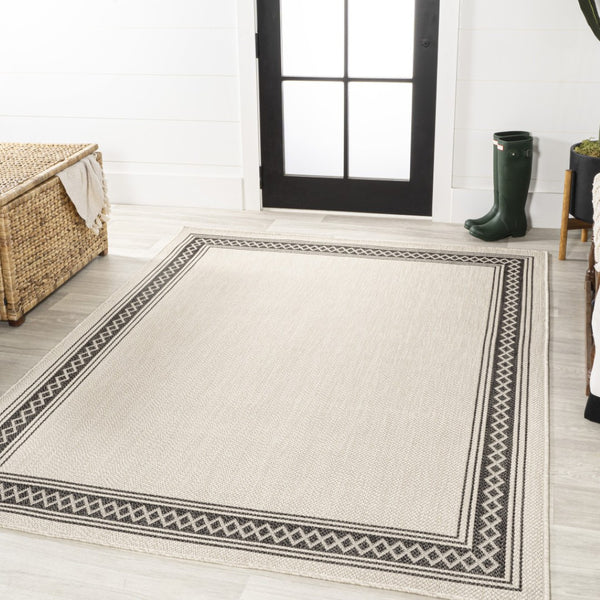 HomeRoots 8' X 10' Cream and Black Area Rug – Durable, Versatile Indoor/Outdoor Style for Any Space, Easy Care! 702923