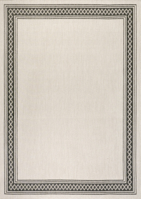 HomeRoots 8' X 10' Cream and Black Area Rug – Durable, Versatile Indoor/Outdoor Style for Any Space, Easy Care! 702923