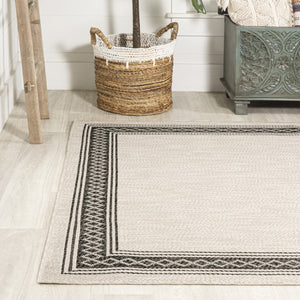 HomeRoots 8' X 10' Cream and Black Area Rug – Durable, Versatile Indoor/Outdoor Style for Any Space, Easy Care! 702923