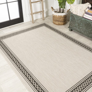 HomeRoots 8' X 10' Cream and Black Area Rug – Durable, Versatile Indoor/Outdoor Style for Any Space, Easy Care! 702923