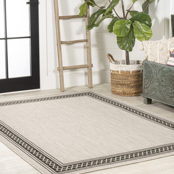 HomeRoots 8' X 10' Cream and Black Area Rug – Durable, Versatile Indoor/Outdoor Style for Any Space, Easy Care! 702923