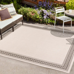 HomeRoots 8' X 10' Cream and Black Area Rug – Durable, Versatile Indoor/Outdoor Style for Any Space, Easy Care! 702923