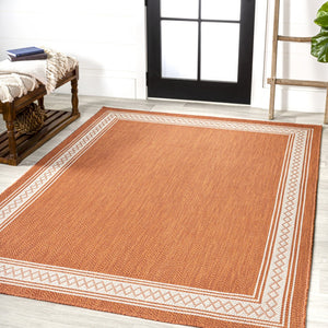 HomeRoots 5' Orange and Cream Indoor Outdoor Area Rug - Durable, Stylish, Low Maintenance for Any Space! 702931