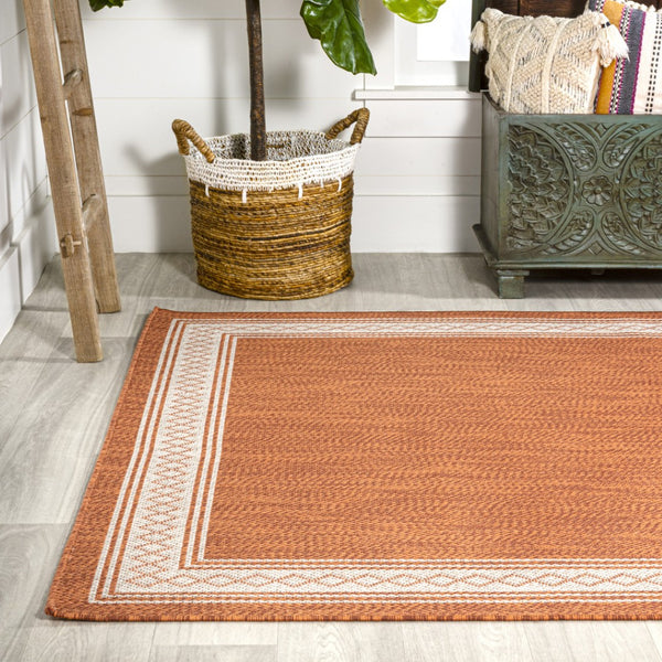 HomeRoots 5' Orange and Cream Indoor Outdoor Area Rug - Durable, Stylish, Low Maintenance for Any Space! 702931
