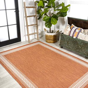 HomeRoots 5' Orange and Cream Indoor Outdoor Area Rug - Durable, Stylish, Low Maintenance for Any Space! 702931