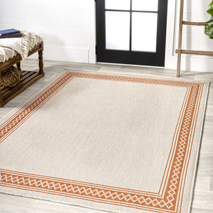 HomeRoots 5' X 8' Cream and Orange Area Rug – Durable, Low-Profile Indoor/Outdoor Accent for Modern Spaces 702934