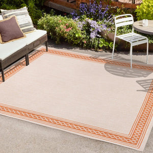 HomeRoots 5' X 8' Cream and Orange Area Rug – Durable, Low-Profile Indoor/Outdoor Accent for Modern Spaces 702934