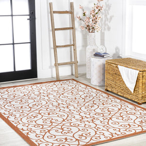 HomeRoots 5' Cream and Orange Geometric Area Rug - Durable Indoor/Outdoor Design for Modern Spaces, Versatile! 703042