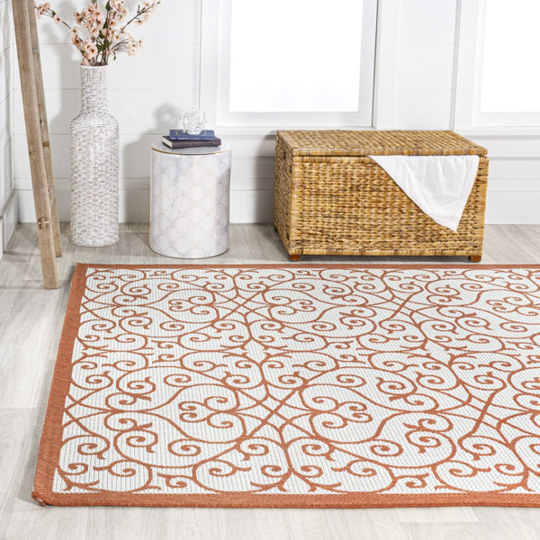 HomeRoots 8' X 10' Cream and Orange Geometric Area Rug - Stylish, Durable Accent for Indoor or Outdoor Spaces 703043