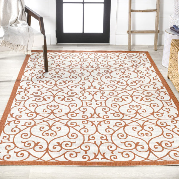 HomeRoots 8' X 10' Cream and Orange Geometric Area Rug - Stylish, Durable Accent for Indoor or Outdoor Spaces 703043