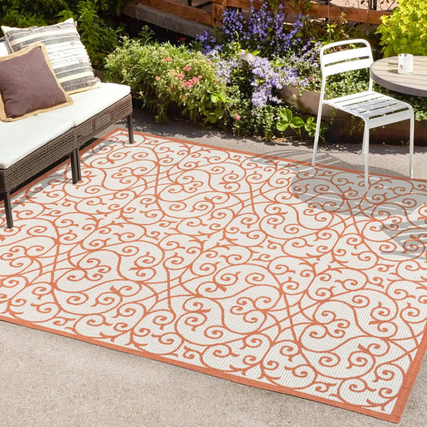 HomeRoots 8' X 10' Cream and Orange Geometric Area Rug - Stylish, Durable Accent for Indoor or Outdoor Spaces 703043