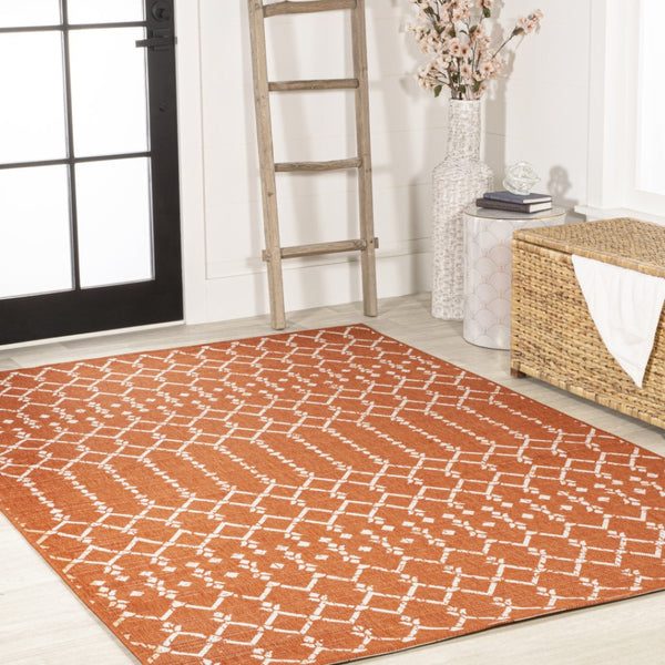 HomeRoots 9' X 12' Orange and Cream Trellis Area Rug - Durable Indoor/Outdoor Solution for Stylish Spaces 703059