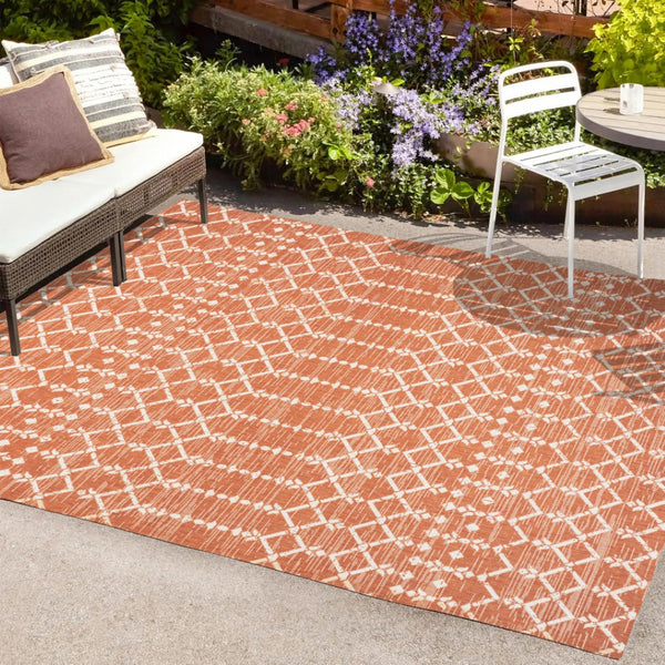 HomeRoots 9' X 12' Orange and Cream Trellis Area Rug - Durable Indoor/Outdoor Solution for Stylish Spaces 703059