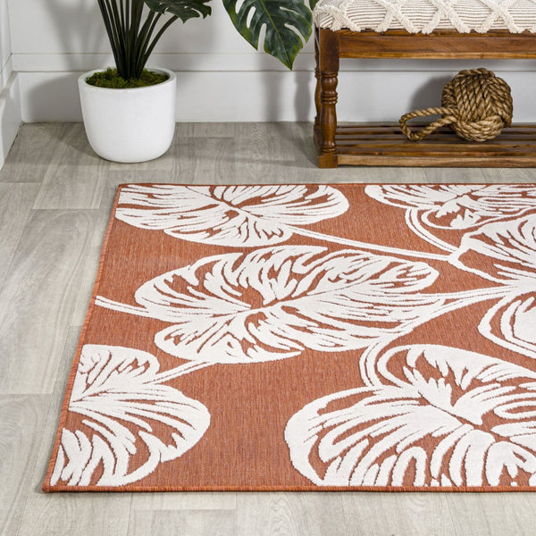 HomeRoots 5' X 8' Orange and Ivory Floral Area Rug - Stylish, Durable Indoor/Outdoor Design for Any Space 703335