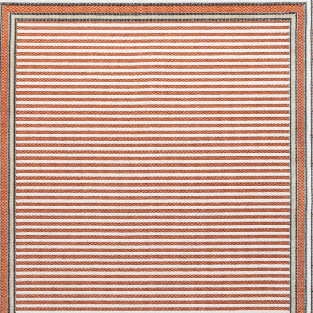 HomeRoots 5' X 8' Orange and Ivory Geometric Rug - Stylish Indoor/Outdoor Design for Modern Spaces, Easy Care 703375