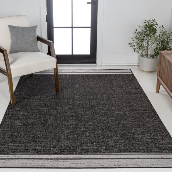 HomeRoots 5' X 8' Black and Cream Area Rug - Stylish Indoor/Outdoor Carpet for Modern Spaces, Easy Care! 703570