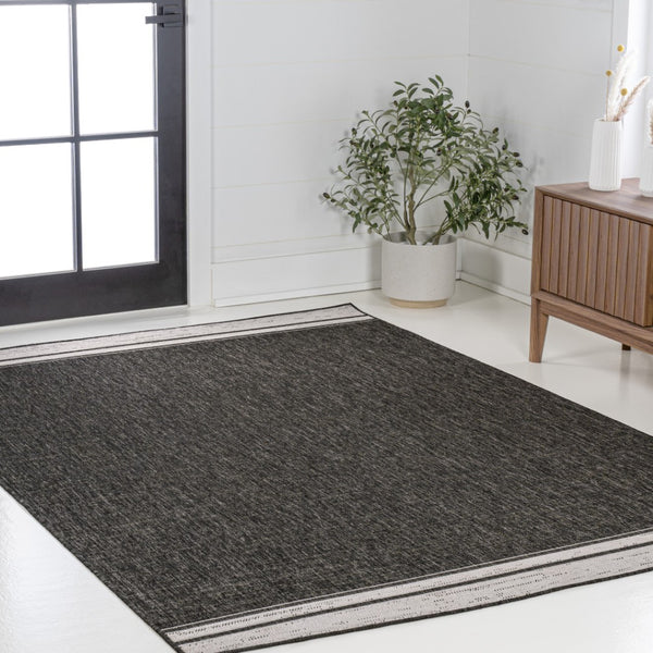 HomeRoots 5' X 8' Black and Cream Area Rug - Stylish Indoor/Outdoor Carpet for Modern Spaces, Easy Care! 703570