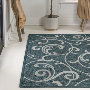 HomeRoots 8' X 10' Turquoise and Cream Floral Area Rug - Stylish Indoor/Outdoor Design for Modern Spaces 703692