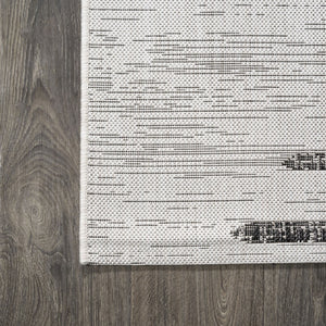 HomeRoots 8' Ivory and Black Round Striped Area Rug - Stylish, Durable Indoor/Outdoor Design for Any Space 703737