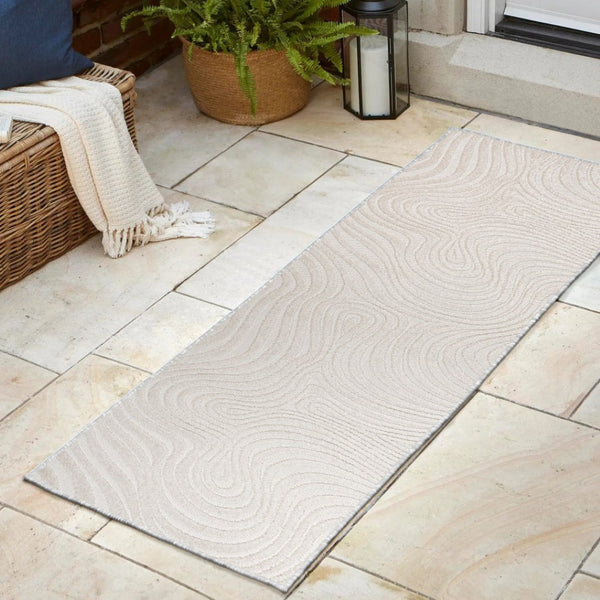 HomeRoots 10' Cream and Ivory Abstract Runner Rug - Versatile Indoor/Outdoor Rug for Hallways & Patios 704085