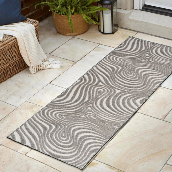 HomeRoots 10' Gray and Ivory Abstract Runner Rug - Stylish, Durable Indoor/Outdoor Pathway Accessory for Any Space 704102