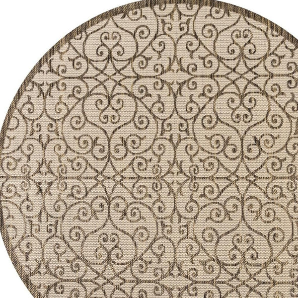 HomeRoots 9' Round Geometric Beige and Brown Area Rug - Versatile Indoor/Outdoor Decor for Modern Spaces 704365