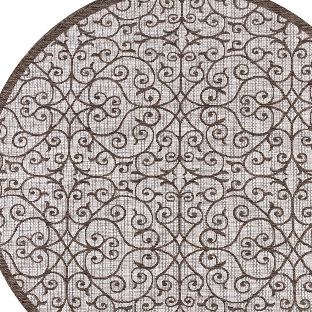 HomeRoots 8' Taupe and Espresso Round Geometric Area Rug - Stylish, Weather-Resistant Design for Indoors & Outdoors 704369