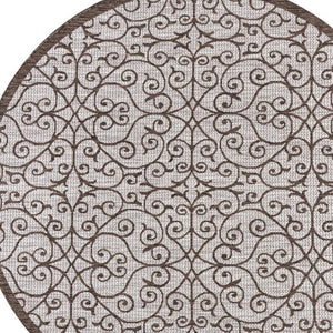 HomeRoots 8' Taupe and Espresso Round Geometric Area Rug - Stylish, Weather-Resistant Design for Indoors & Outdoors 704369