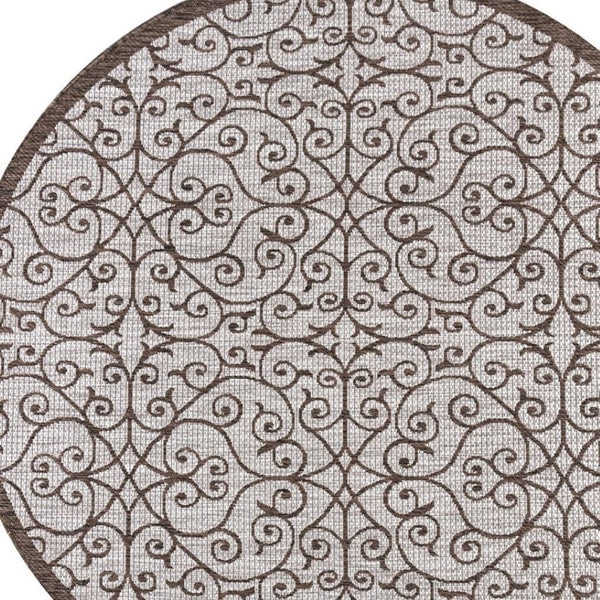 HomeRoots 8' Taupe and Espresso Round Geometric Area Rug - Stylish, Weather-Resistant Design for Indoors & Outdoors 704369