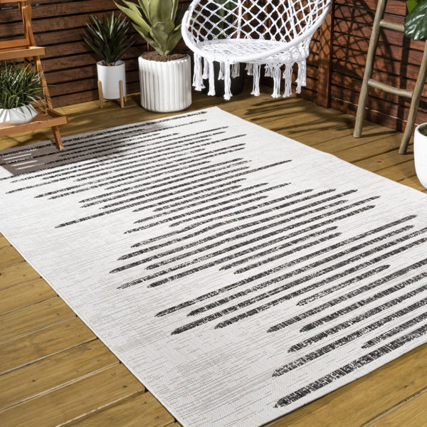 HomeRoots 6' Ivory and Black Striped Area Rug – Stylish, Durable Indoor/Outdoor Design for Modern Spaces 704531