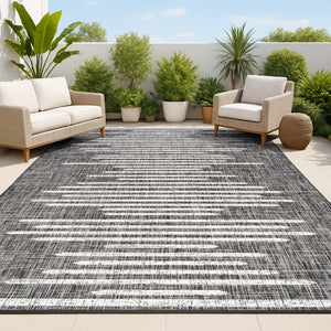 HomeRoots 10' Stylish Black and Ivory Striped Indoor Outdoor Area Rug - Durable, Versatile, Easy Care Design 704532