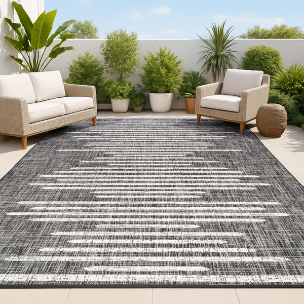 HomeRoots 10' Stylish Black and Ivory Striped Indoor Outdoor Area Rug - Durable, Versatile, Easy Care Design 704532
