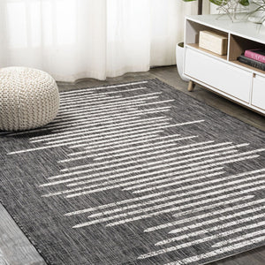 HomeRoots 10' Stylish Black and Ivory Striped Indoor Outdoor Area Rug - Durable, Versatile, Easy Care Design 704532