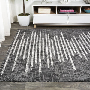 HomeRoots 10' Stylish Black and Ivory Striped Indoor Outdoor Area Rug - Durable, Versatile, Easy Care Design 704532