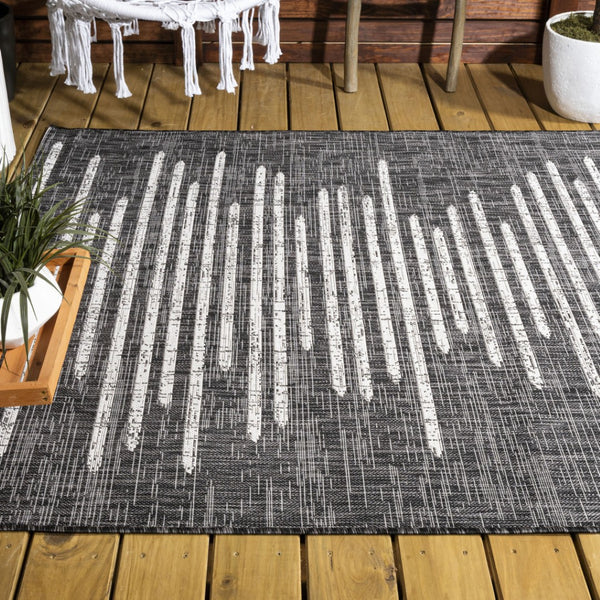 HomeRoots 10' Stylish Black and Ivory Striped Indoor Outdoor Area Rug - Durable, Versatile, Easy Care Design 704532
