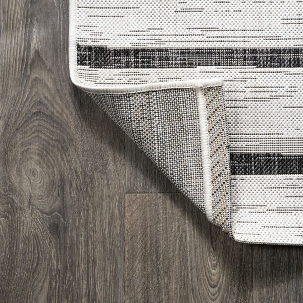 HomeRoots 5' Modern Ivory and Black Striped Round Area Rug - Durable, Easy-Care Design for Indoor/Outdoor Use 704557