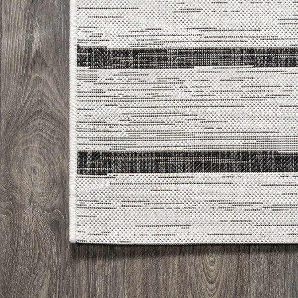 HomeRoots 5' Modern Ivory and Black Striped Round Area Rug - Durable, Easy-Care Design for Indoor/Outdoor Use 704557