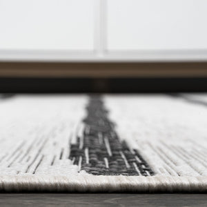 HomeRoots 5' Modern Ivory and Black Striped Round Area Rug - Durable, Easy-Care Design for Indoor/Outdoor Use 704557