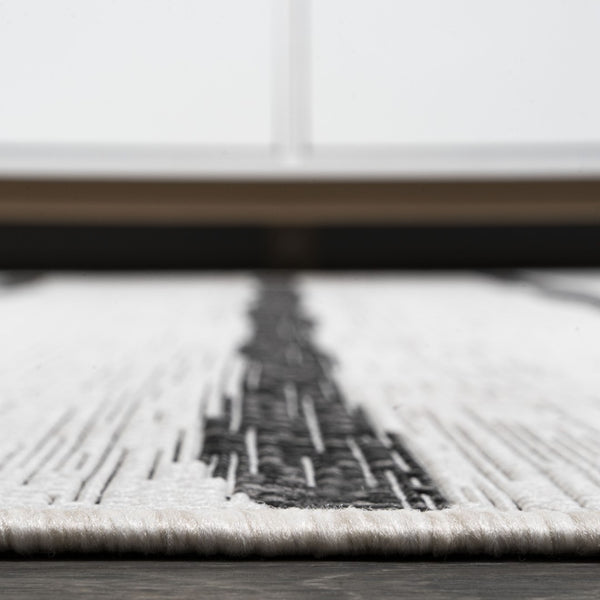 HomeRoots 5' Modern Ivory and Black Striped Round Area Rug - Durable, Easy-Care Design for Indoor/Outdoor Use 704557