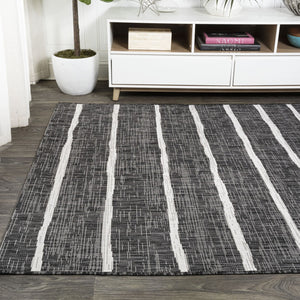 HomeRoots 9' Black and Ivory Striped Area Rug - Versatile Indoor/Outdoor Solution for Stylish Spaces 704576