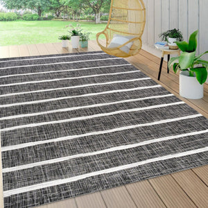 HomeRoots 9' Black and Ivory Striped Area Rug - Versatile Indoor/Outdoor Solution for Stylish Spaces 704576