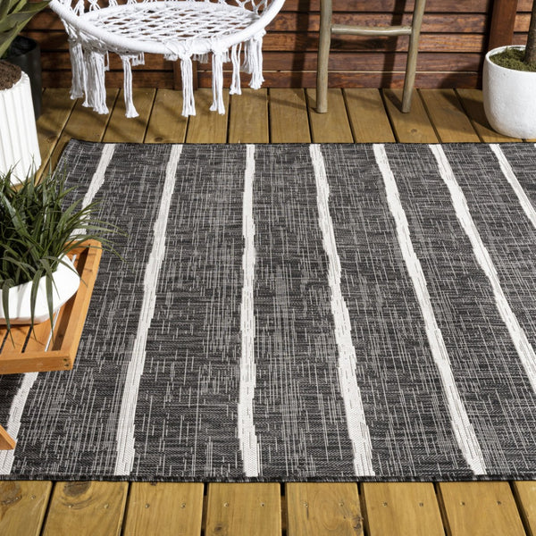 HomeRoots 9' Black and Ivory Striped Area Rug - Versatile Indoor/Outdoor Solution for Stylish Spaces 704576