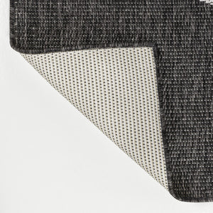 HomeRoots 4' X 6' Black And Cream Geometric Area Rug – Stylish Indoor/Outdoor Design for High-Traffic Spaces 704627