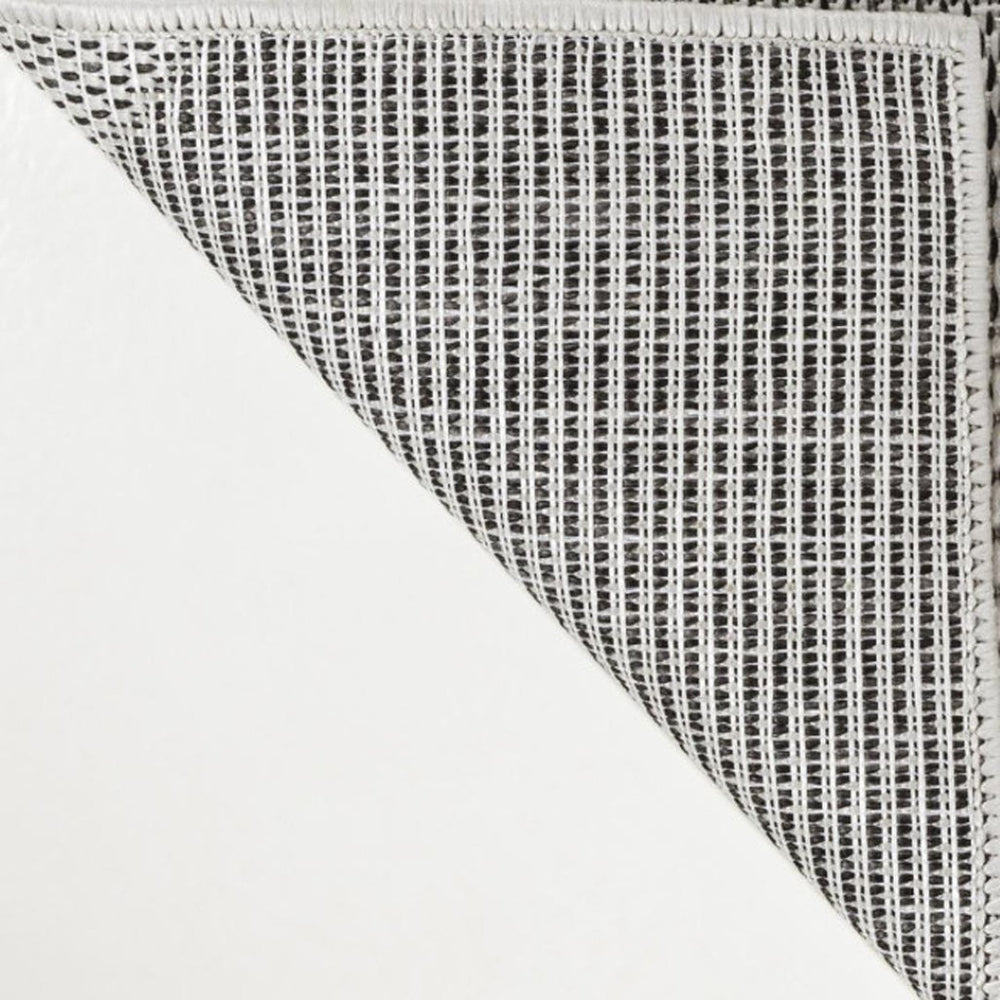 HomeRoots 5' Modern Cream and Black Geometric Indoor-Outdoor Area Rug - Durable, Low-Maintenance & Stylish! 704653