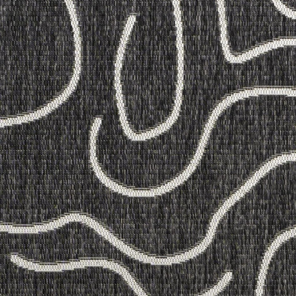HomeRoots 5' X 8' Black and Cream Abstract Area Rug - Stylish Indoor & Outdoor Modern Accent for Any Space 704688