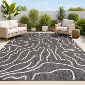 HomeRoots 5' X 8' Black and Cream Abstract Area Rug - Stylish Indoor & Outdoor Modern Accent for Any Space 704688